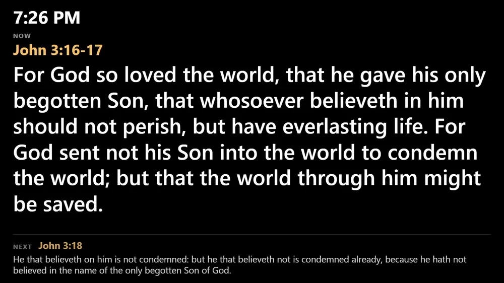 The stage screen: the time, John 3:16-17 in large letters, and the next verse, John 3:18, below